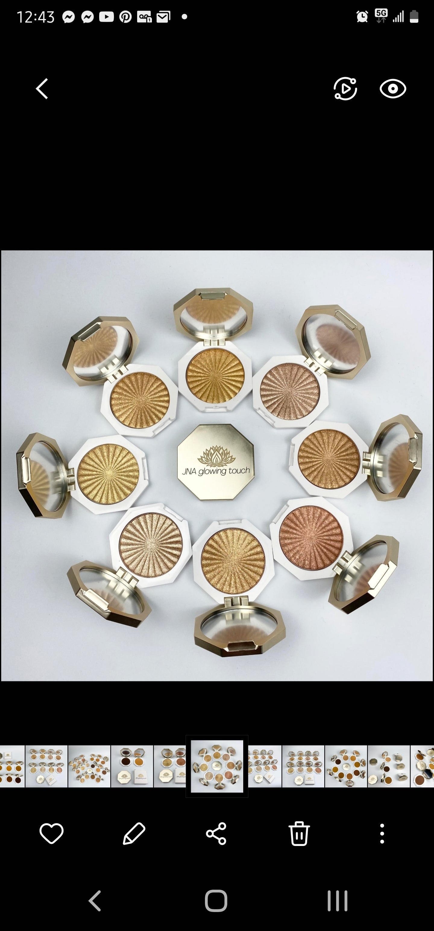 JNA glowing touch highlighter in gold and bronze compact form.